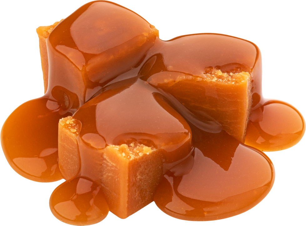 Caramel candy and caramel sauce isolated