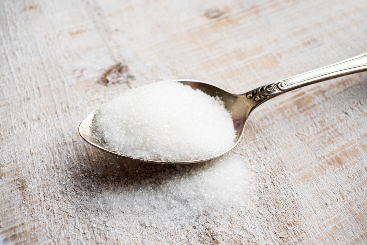 Artificial Sweeteners and Sugar Substitutes in Metal Spoon. Natu