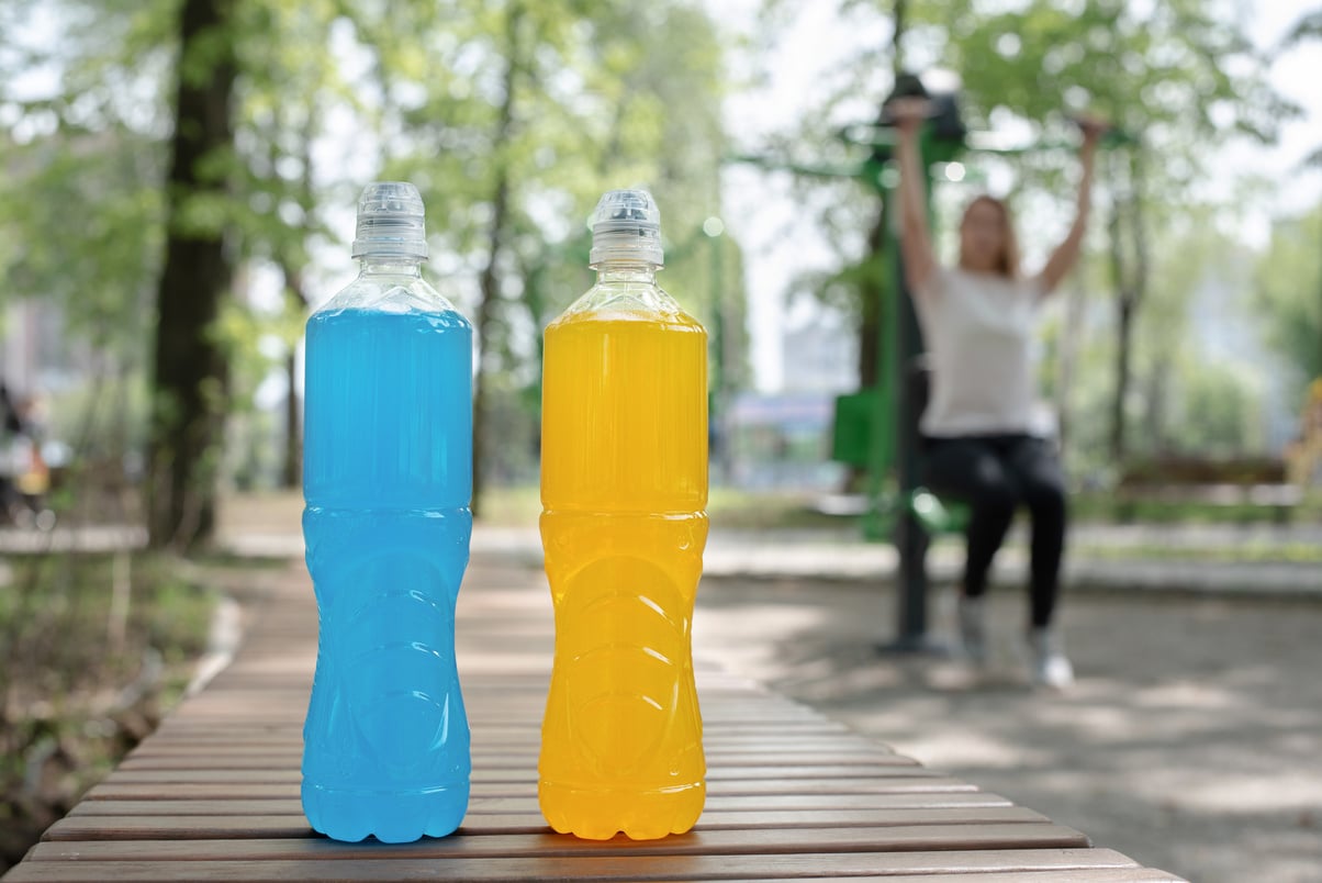 Bottles of Electrolytes on a Park Bench 